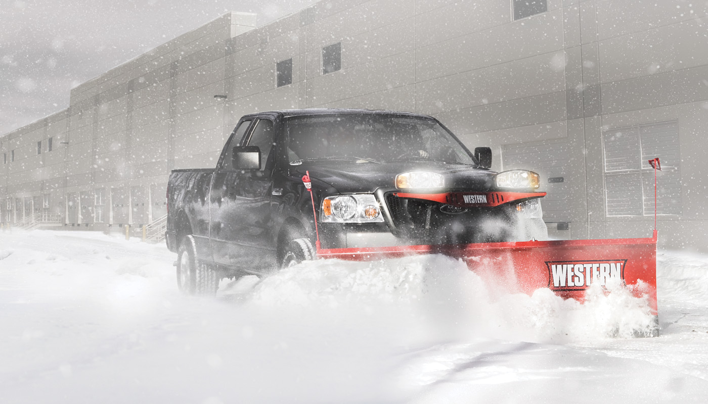 HTS plow on truck in action
