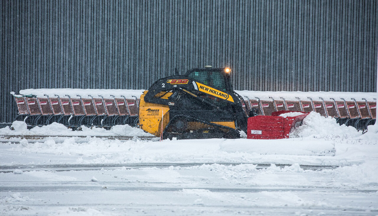 PILE DRIVER XL Skid Steer Pushing Snow Side View